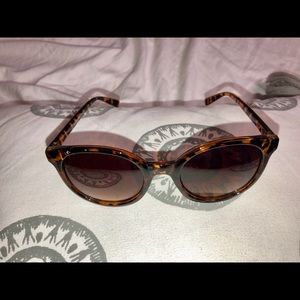 golden orange and black sunglasses